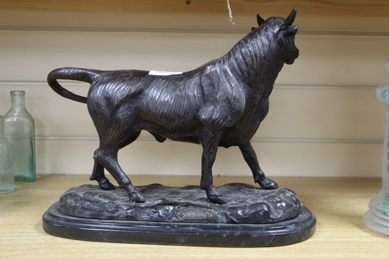 A bronze of a bull, on a marble base, signed A.L. Barye, height 27cm